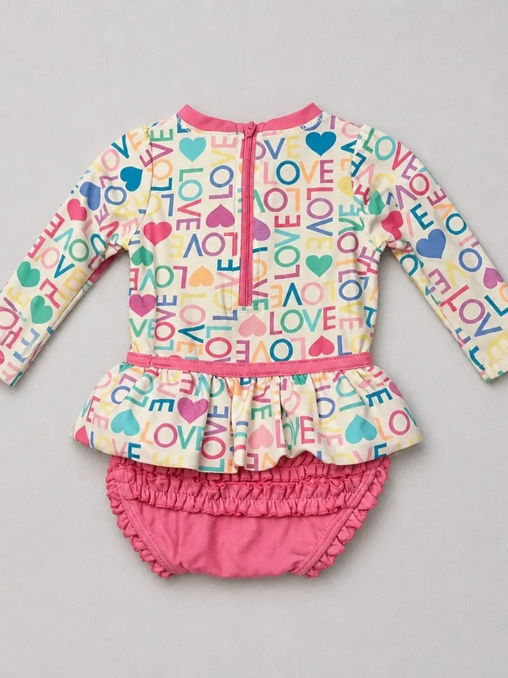 Ruffle Butts pink Love print ruffle bottom one piece rash guard swim-flaw